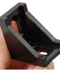 Close-up of a black corner bracket from Aluminum Profile Connector Kit for 6mm Slot Profiles, great for DIY framing and builds.