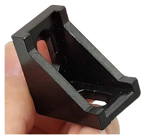 Close-up of a black corner bracket from Aluminum Profile Connector Kit for 6mm Slot Profiles, great for DIY framing and builds.
