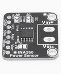 Top Shelf I2C Current Voltage Power Sensor Module With 1 Percent Accuracy And 16 Bit High Speed Readouts showing black circuit board and connections.