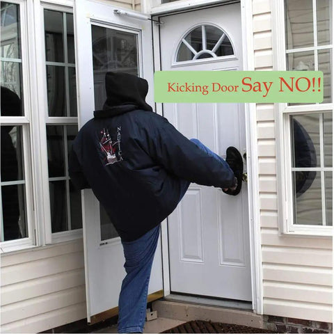 Person demonstrating force against door secured by Lock It Down Home Security Door Lock Set 2 Pack Child Proof Reinforcement Locks