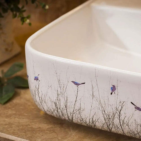 Ceramic Vessel Sink For Bathroom Vanity, Above Counter Rectangular Wash Basin Featuring Hand Painted Nordic Artistry with bird design.