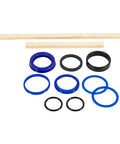 Top view of Rotary Lift hydraulic cylinder seal kit with blue and black O-rings and seals.