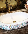 Damn Fine Hand Painted Oval Countertop Washbasin With A Truly Knockout Leaf Pattern Heavy Duty Ceramic Bathroom Sink on marble.