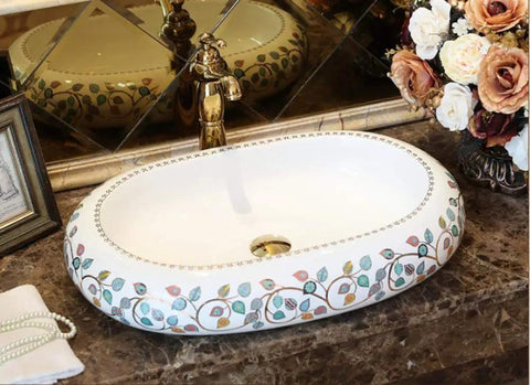 Damn Fine Hand Painted Oval Countertop Washbasin With A Truly Knockout Leaf Pattern Heavy Duty Ceramic Bathroom Sink on marble.