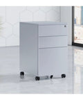 Rolling Steel File Cabinet With Locking Drawers for Home Office on wheels, three-drawer unit in a modern interior setting