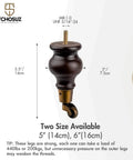 Close-up of Six Inch Walnut Wood Furniture Legs With Casters Two Pack showing 5-inch size and caster wheel