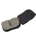 Mini Bike Disc Brake Pads For Predator 79cc To 105cc Engines shown in close-up view, showcasing brake surface texture and backing.