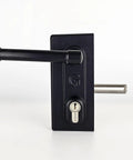 Badass Stainless Steel Gate Lock With Adjustable Deadbolt And Three Keys For Heavy Duty Fence Security Built Tough For Daily Outdoor Use On Wood Or Metal Gates - side view with handle and keyhole