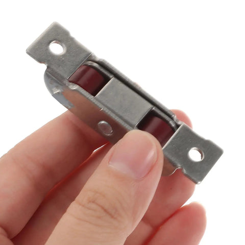 12 Pack Rock Solid Sliding Door And Window Sash Pulleys Featuring Double Wheel Rollers Easy Install Replacement Hardware, shown in hand, detail of roller.
