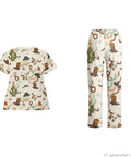 Women Western Cowboy Print Scrubs Set With Deep Multi Pocket Elastic Waist Healthcare Uniforms For Nurses And Dental Assistants Designed For Go Getter Days And Ride Or Die Comfort featuring a soft polyester blend top and cargo pants.
