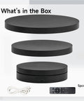 Show Off Your Cool Stuff With This Electric Rotating Display Stand That Spins 360 Degrees Smoothly Featuring A Handy Remote Control, Three Speed Modes, And Flexible Power Options For USB Or Battery To Make Your Products Pop At Home Or In Business. Box contents showing three black platforms and remote.