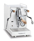 Front view of Mini Cellini Espresso Machine With Steam Wand And Pressure Gauge, white paneling, chrome accents, wood details.