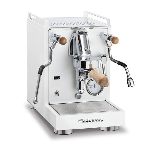 Front view of Mini Cellini Espresso Machine With Steam Wand And Pressure Gauge, white paneling, chrome accents, wood details.