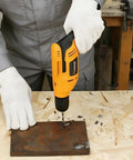Person using Powerful 400W Corded Drill For DIYers And Handy Pros, 0-3500 RPM Variable Speed, drilling into metal surface