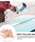 Person using dent pulling ring kit for auto body and sheet metal repair, 200 piece set with precision shaping