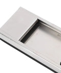 Top view of silver pressure plate from game changing golf swing training aid with gravity pedal, showing metal surface