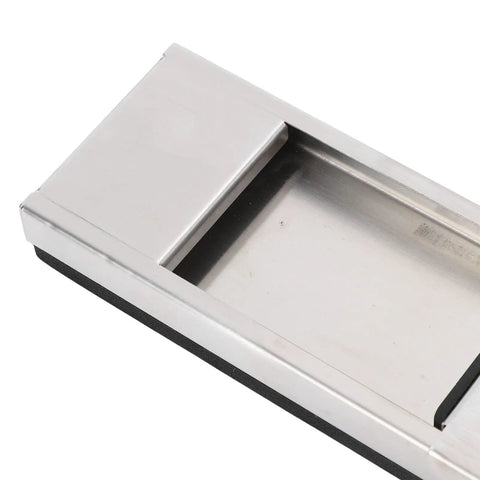 Top view of silver pressure plate from game changing golf swing training aid with gravity pedal, showing metal surface