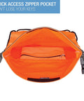 Interior view of orange Waterproof Locking Backpack With Secura Lock Security, Anti Theft 3 Digit Combo, showing zipper pocket.