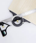 300mm Adjustable Sliding Protractor Ruler in stainless steel for precision carpentry and drafting, shown measuring wood angle