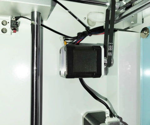 Installed NEMA 17 stepper motor with belt drive inside a CNC/3D printer; black housing, 48mm frame, 4-lead cable