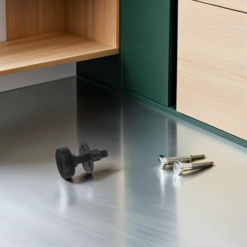 Close-up of 4 Pack Adjustable Furniture Leveling Feet with 3/8-16 Thread on a metal surface near screws.