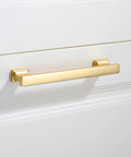 Close-up of 10 Pack Brushed Gold Cabinet Handles 6 Inch Length With 5 Inch Center To Center Hole Solid Metal Kitchen Cabinet Pulls installed on drawer