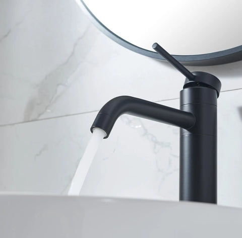 Go-To Matte Black Vessel Sink Faucet Tall And Sleek For 1 Hole Mount 360 Degree Swivel Single Handle Mixer Spout Stainless Steel Bathroom Faucet With Pop Up Drain in use.