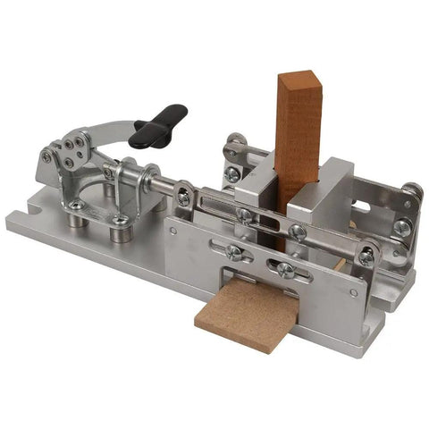 Self Centering Pen And Bottle Stopper Drilling Vise For Wood Turners Keeps Pen Blanks Secure On The Drill Press With Parallel Jaws For Ultra Accurate Drilling Across Wood, Acrylic Or Composite Materials, Pro Grade, with visible wood blank secured in vise.