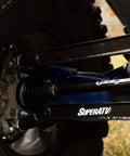 Arched Boxed Radius Rods for Polaris RZR Pro XP and Pro XP 4 Off Road Upgrade With High Ground Clearance Beefy Rugged Steel Build Powder Coated Black Finish Easy Install And Durable Performance installed on rear wheel
