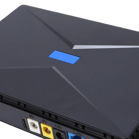 Hassle Free Mini UPS Battery Backup For Router And Modem 8800mAh US Plug, black exterior, ports for power and LAN.