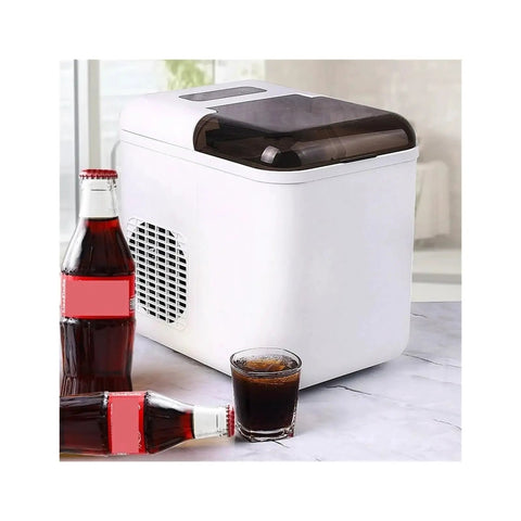 Fast Countertop Ice Maker Portable With Self Cleaning Setup Produces Crisp Cubes In Minutes next to drinks on a countertop.