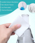 Hand using Top Shelf 900 Pack Cleanroom Wipes Straight Up Lint Free Nonwoven Microfiber on laboratory flask.