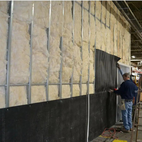 Premium Mass Loaded Vinyl Soundproofing Rolls Heavy Hitter Noise Blocking Barrier being installed on wall with insulation.