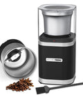 Electric Coffee Bean Grinder With Slick One Touch Operation And 180W Motor Brewing Fresh Espresso Right Quick With A Removable Stainless Bowl For 12 Cups And Brush In Sleek Black on counter with coffee beans and brush.