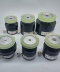 Six black YHZ magnetic dampers with white dial scales and pale yellow tops
