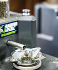 Close-up of Intellidropper Electronic Powder Measure With Auto And Manual Trickle, 0.1 Grain Accuracy, dispensing powder into a dish.