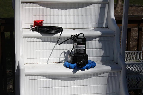 Reinforced Thermoplastic Pool Cover Pump With One Quarter HP Motor, Auto On Off, iSwitch Sensor on white steps