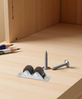10 Pack Heavy Duty Mini Furniture Casters That Roll Like A Dream With Silent TPE Pads For Tool Benches Cabinet Drawers And Office Desks Quick Bolt Install on a wooden surface with screws.