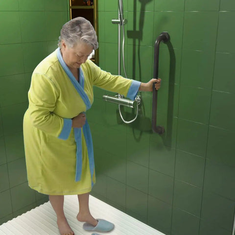 Elderly woman using 2 Pack 24 Inch Anti Slip Shower Grab Bar with Oil Rubbed Black 1.25 Inch Knurled Easy Grip Safety Hand Rail