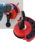 Diamond drill bit hole saw guide with vacuum base suction cup; red body with blue mounting plate.