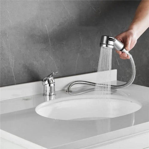 Salon Shampoo Bowl Faucet Kit With Hose And Shower Spray Head For Backwash Units, Chrome Finish, being used on a white sink