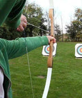 Archer aiming at targets with bow using 24 Pack Steel 100 Grain Arrow Field Points Screw In Practice Target Tips For Recurve Bow Compound Bow And Crossbow Bolts Built Tough And Rust Resistant For Training And Hunting.