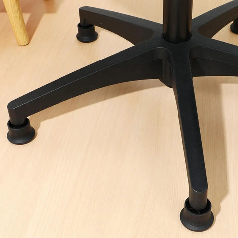 Close-up of Six Pack Office Chair Glides Furniture Feet For Desk Chairs Black Iron And PP Material on a wooden floor
