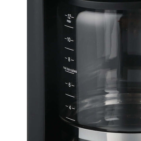 Close-up of 12-Cup Touchscreen Coffee Maker With Glass Carafe, showing measurement markings for brew strength control and iced coffee mode.