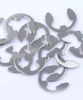 Close-up of stainless steel E-shaped retaining rings from Stainless Steel E Shaped Retaining Ring Set Dope 400-Piece Shaft Clip Kit M1.5 To M15.