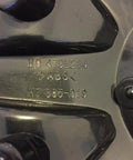 Close-up of Black Wheel Center Cap 479L214 HT 005-019 Replacement Dope Look No Screws Included, showing model number engraving