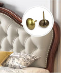 Hella Sturdy Gold Upholstery Tacks 100 Pack Set For Furniture Nailhead Decorative Trim displayed near elegant upholstered headboard.