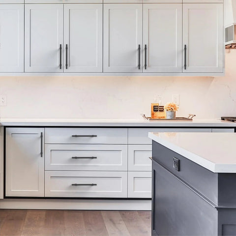 Modern kitchen with white cabinets featuring matte black cabinet pulls 5 inch 128mm hole centers set of 10 durable metal construction