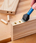 Silicone Glue Brush Kit For Woodworking, Dual Ended Dowel Glue Applicator on wooden surface with dowel holes