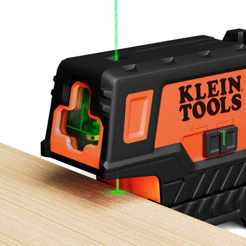 Compact Self Leveling Laser Level With Plumb Spot, Bright Green Cross Lines, 75 Foot Range, Class 2 Laser on wooden surface